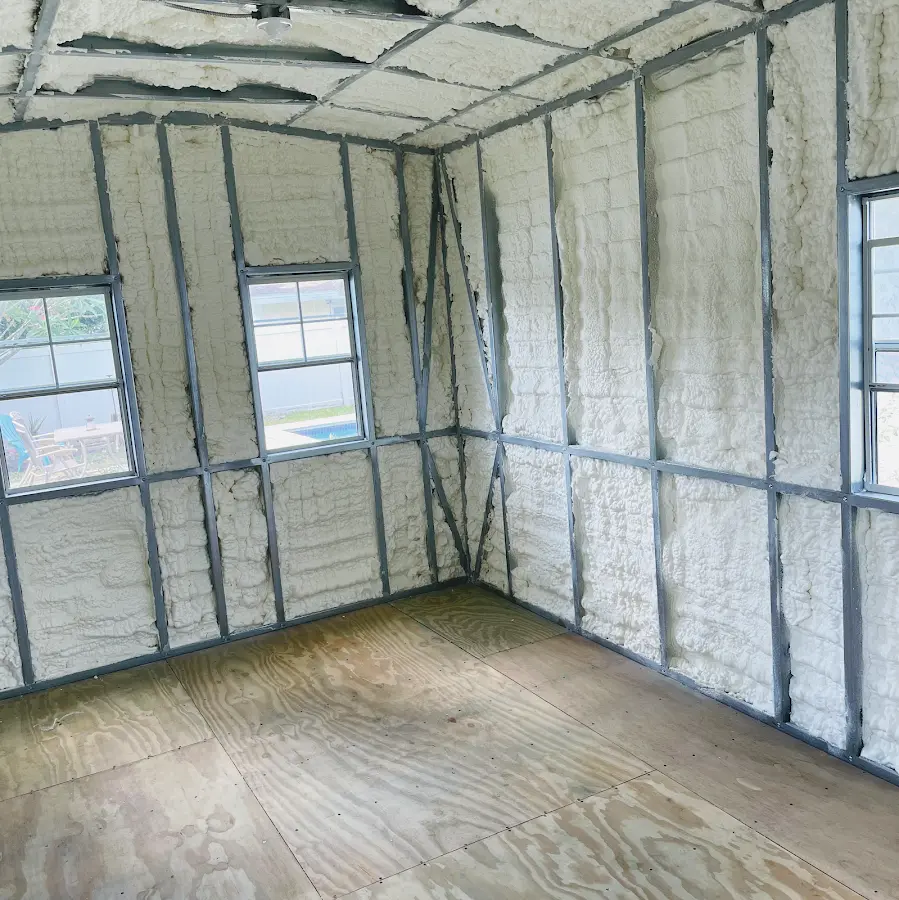 Closed-cell spray foam insulation applied to wall cavities in a residential project in Maywood